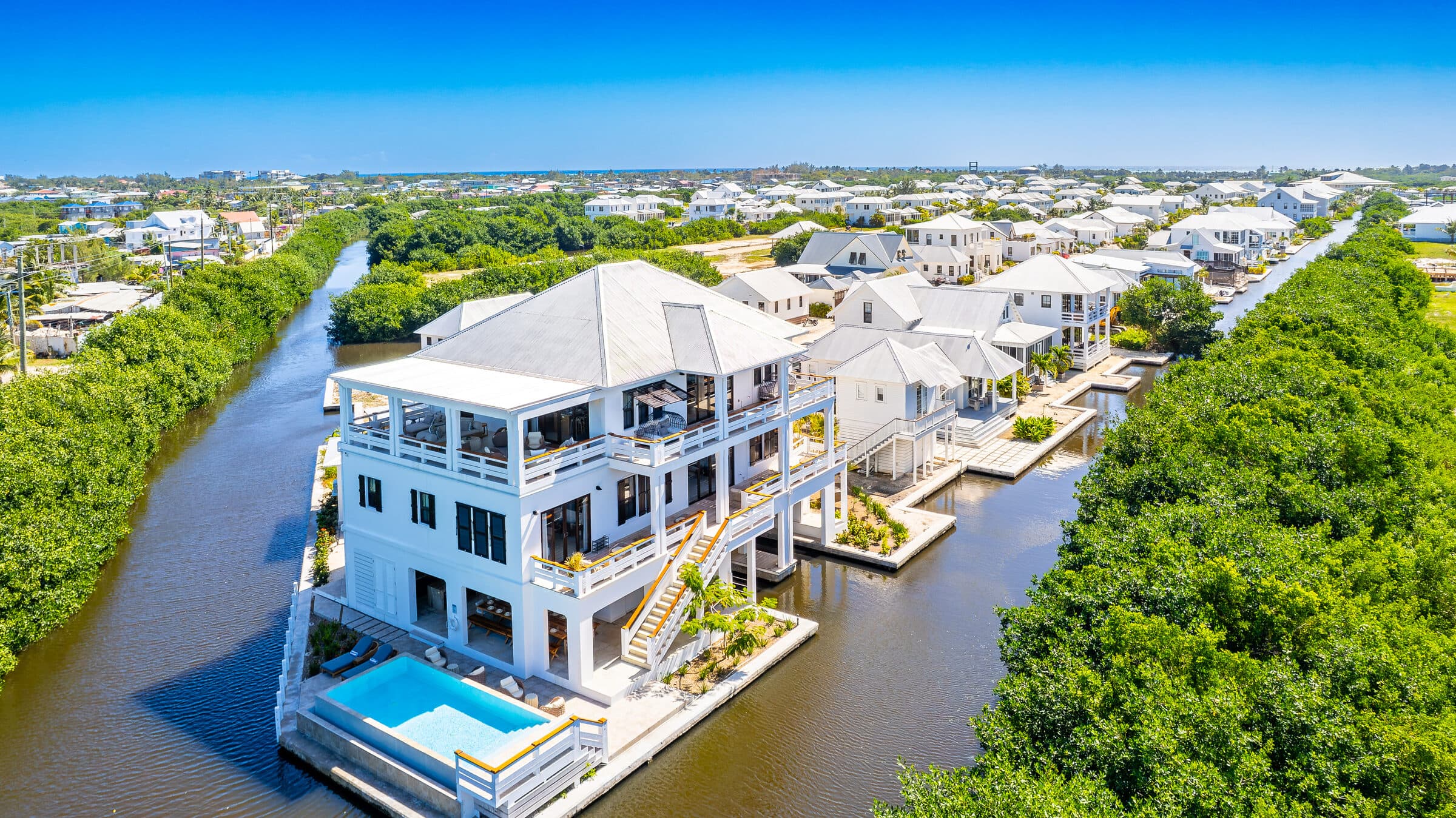 Drone view of the BelaDia waterfront compound and three private casitas in San Pedro, Belize